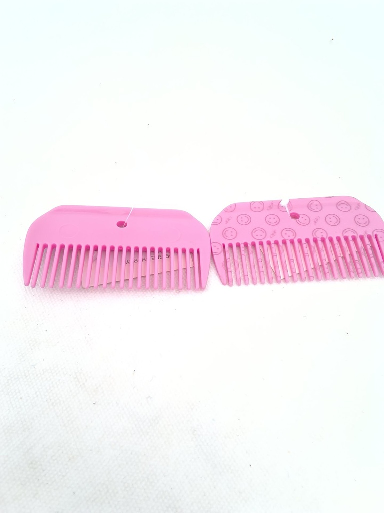 Peigne plastique rose Qhp